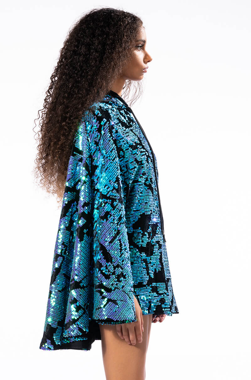 Talking In Circles Sequin Poncho Dress